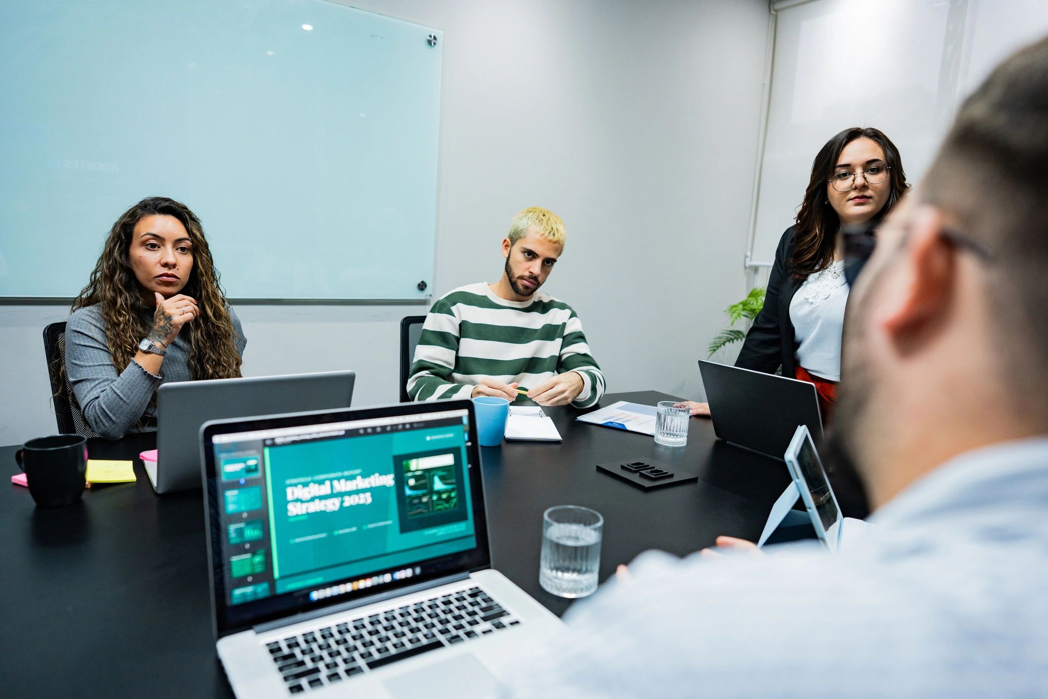 Team members collaborating in a meeting